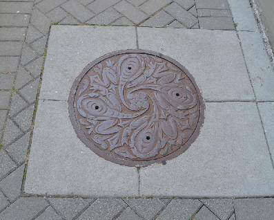 Olympic Village Ironclad Art Storm Sewer Cover