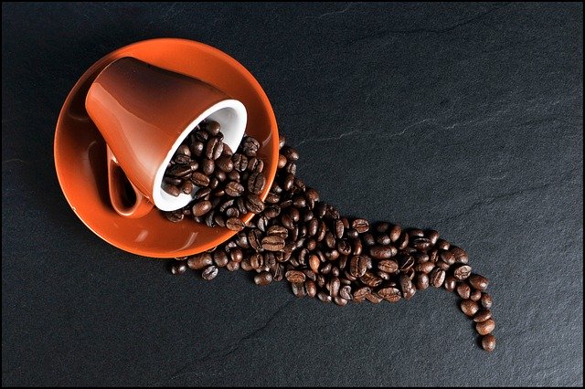 Coffee Cup Spilling Beans